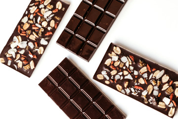 Handmade chocolate, assorted dark chocolate with nuts and goji berries.