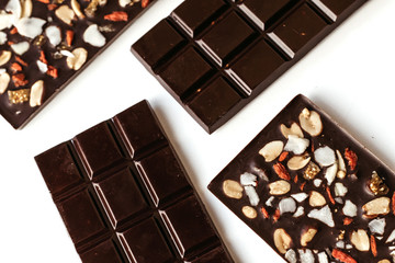Handmade chocolate, assorted dark chocolate with nuts and goji berries.
