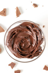 Sweet Chocolate cream in glass bowl. Confectionery, sweet life, calories.
