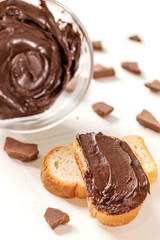Sweet Chocolate cream in glass bowl. Confectionery, sweet life, calories.