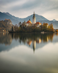 Amazing autumn scenery of lake Bled with and island reflection, Slovenia