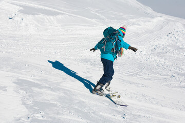 Fototapeta na wymiar Woman, snowboard winter, back, backpack