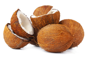 broken coconut on a white background close up