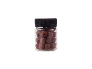 jar with black lid with colorful granules inside, quick snack concept, alternative to food, new kind of food, freeze-dried batochniki, eco-friendly products