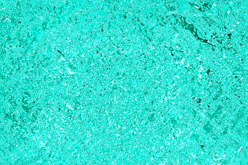 Fototapeta na wymiar texture of turquoise water. seawater background. water in the pool