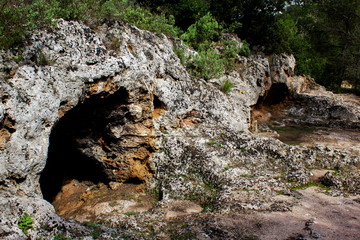 View of Prehistoric Caves in the City of Cala Sant Vicent, Mallorca, Spain 2018 - 304984171