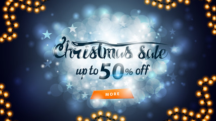 Christmas sale, up to 50% off, blue discount banner with blurred background