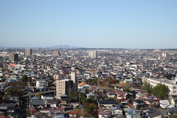 Fototapeta na wymiar 御隅櫓から望む秋田市中心部