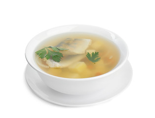 Delicious fish soup in bowl isolated on white