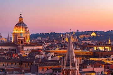 View of sunset city Rome from Castel Sant Angelo, Saint Peters Square in Vatican