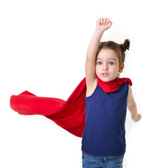 Adorable little girl flying like a superhero in blue t-shirt and red mantle. Super girl. The new...