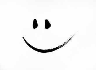 Simple smiley smiley face in black painted on a piece of paper. - obrazy, fototapety, plakaty