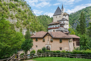 Fototapeta na wymiar The medieval sanctuary of San Romedio. Non Valley, Trento province, Trentino Alto-Adige, Italy, Europe. The Sanctuary is situated on a steep rocky spur in the natural scenery of the Val di Non