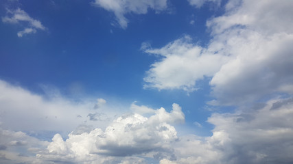 Naklejka na ściany i meble Beautiful blue sky background with cirrus clouds