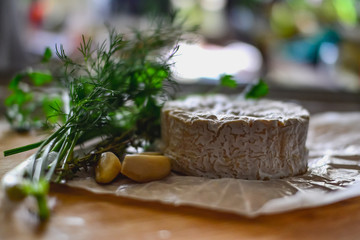 Delicious Brie Cheese with White Mold and Herbs