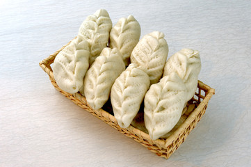 Chinese buns in basket.