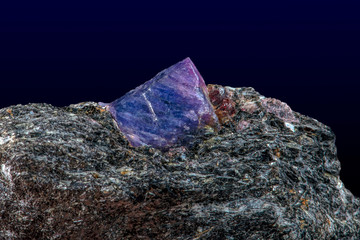 Macro mineral raw uncut blue sapphire crystal, detail