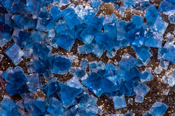 Blue raw fluorite crystal , macro, close up