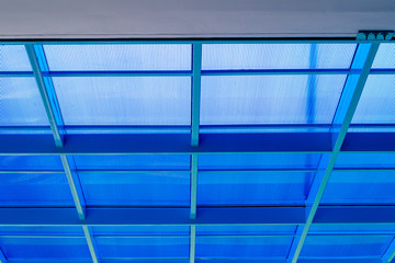Steel frame and blue polycarbonate plastic roof