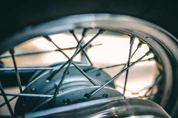 Close up view on wheel and spokes of motorcycle