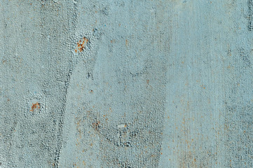 Light blue faded. Texture of stained metal surface with cracked paint with cracked paint. Finely detailed background