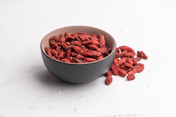 Goji berries isolated on white background. Healthy eating, copy space.