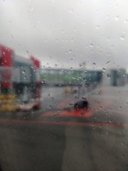 rain drops on window in the airport