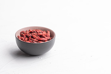 Goji berries isolated on white background. Healthy eating, copy space.