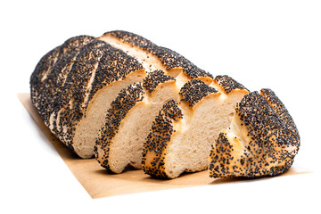 Poppy seed white loaf bread isolated on white
