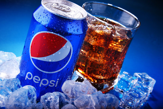 Can and glass of Pepsi with crushed ice