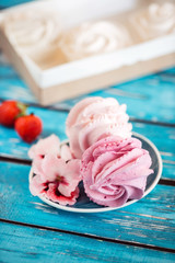 Beautiful delicious dessert. Zephyr in the shape of flowers roses.