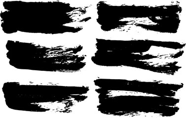 Set of abstract black textured strokes of dry paint on white background