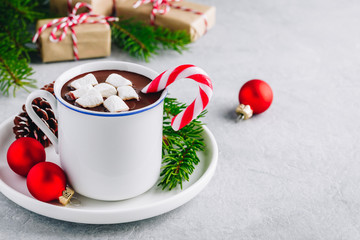 Obraz na płótnie Canvas Festive Christmas Hot Chocolate with marshmallow and candy cane