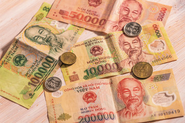 Fototapeta na wymiar Vietnamese dong VND banknotes and coins