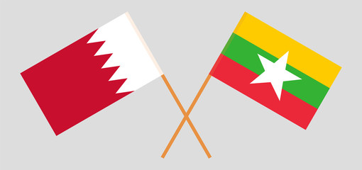 Crossed flags of Myanmar and Bahrain
