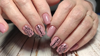 stylish design of manicure on beautiful nails