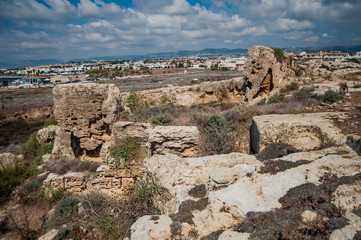 Fototapeta premium The rocks and former quarries of ancient Paphos are very similar to the foundations of the walls, towers, ditches and counterscarps of medieval fortifications. Is that so? Riddle. 