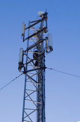 cell tower on blue sky background