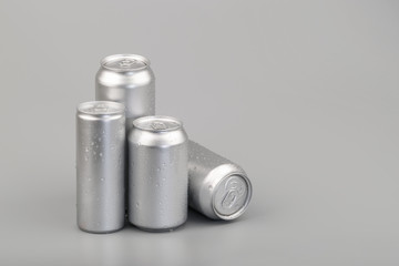 wet metal aluminum beverage drink cans. photography