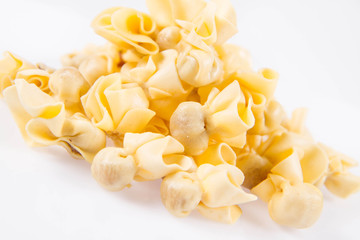 Sacchettini pasta on a white background