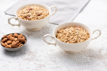Granola, oatmeal with almond food background