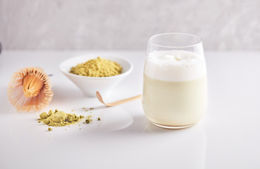  Matcha green tea powder view from above, traditional matcha tea preparing , white background. 