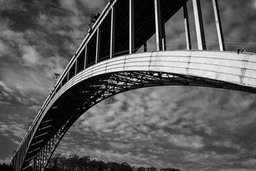 black and white bridge shot with dramatic clouds