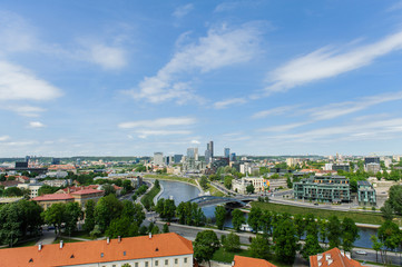 Fototapeta na wymiar Beautiful and bright panorama of Vilnius town from the top of the Gediminas hill. New town