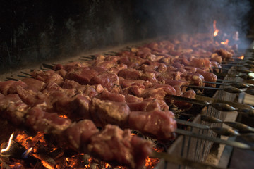 The process of preparing a delicious barbecue on a large grill