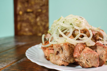 Freshly cooked tasty barbecue on a large wooden table