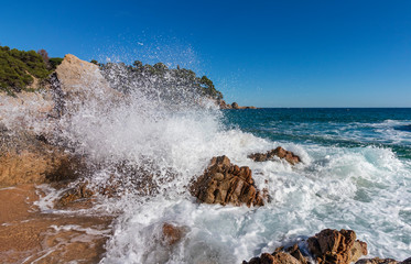 On a beach in Lloret de Mar, water in peace and movement