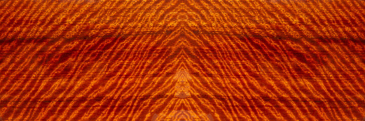 Nature Padauk wood has tiger stripe or curly stripe grain