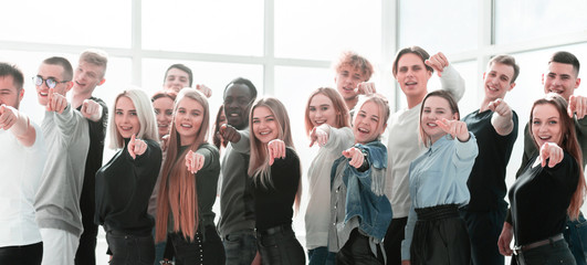 Fototapeta premium group of young like-minded people pointing at you