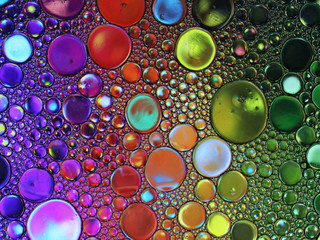 Abstract multicolor water oil soap bubbles mixed texture with stars